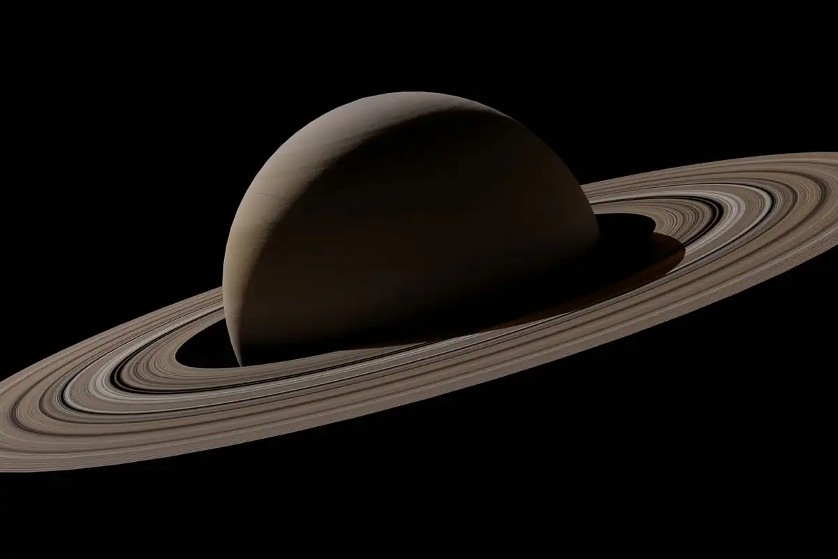Planeta Saturn cu inelele ei pe fundal negru